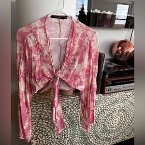 The cutest crop flared sleeve top.